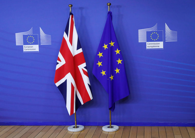 © Reuters. Flags are seen at the EU Commission headquarters ahead of a first full round of talks on Brexit, Britain's divorce terms from the European Union, in Brussels