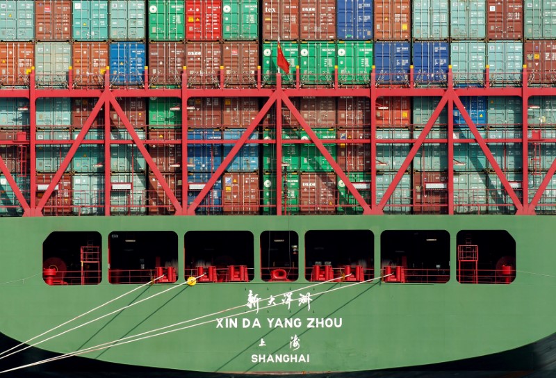 © Reuters. FILE PHOTO: China Shipping containers sit on a ship in the Port of Los Angeles after being imported to the U.S.