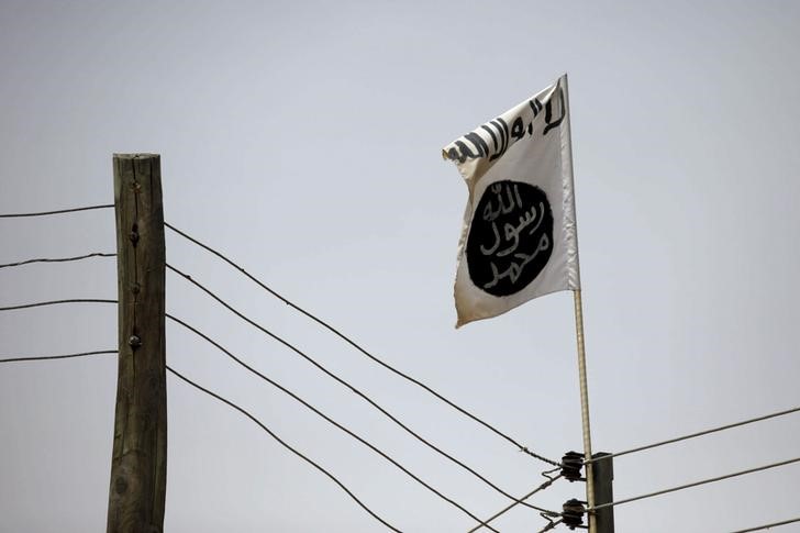 © Reuters. Boko Haram flag flies in Damasak