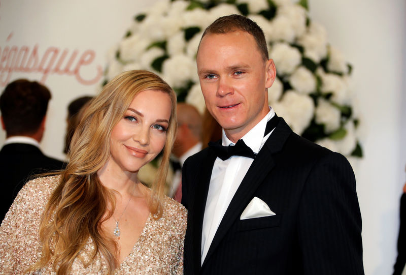 © Reuters. Four times Tour de France winner Chris Froome arrives with his wife Michelle Cound for the annual Red Cross Gala in Monaco