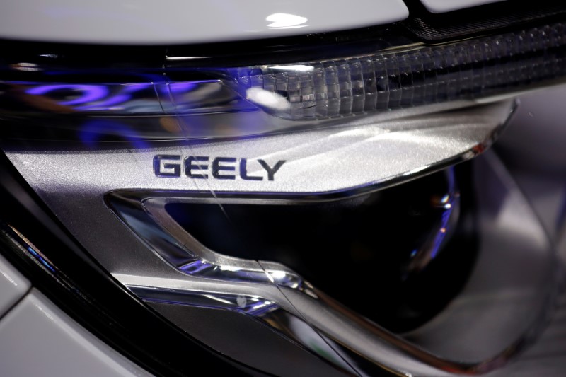 © Reuters. FILE PHOTO -  A sign is seen on a vehicle displayed at Geely Auto's booth during the Auto China 2016 auto show in Beijing