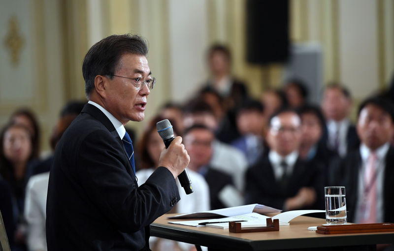© Reuters. South Korean President Moon Jae-In speaks during a press conference marking his first 100 days in office at the presidential house in Seoul