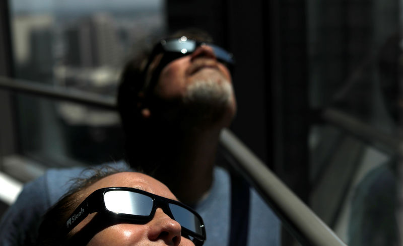 © Reuters. Solar eclipse sunglasses are pictured in Los Angeles