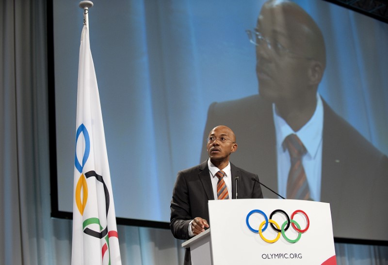 © Reuters. FILE PHOTO - International Olympic Committee (IOC) member Namibian former sprinter Fredericks speaks at the second part of the 121st International Olympic Committee session in the Bella Center in Copenhagen