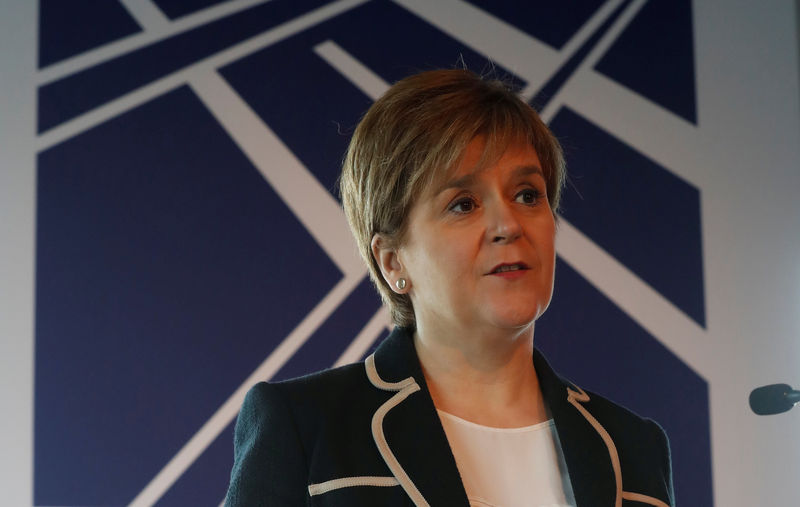 © Reuters. FILE PHOTO - Scotland's First Minister Nicola Sturgeon speaks at the official opening of the recently completed section of the M8 motorway near Glasgow, Scotland