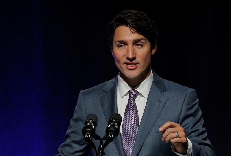 © Reuters. رئيس وزراء كندا يعلن مقتل كندي وإصابة 4 في هجوم برشلونة