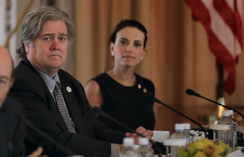 © Reuters. White House Chief Strategist Bannon listens with Deputy National Security Advisor for Strategy Powell during Trump-Xi bilateral meeting in Palm Beach