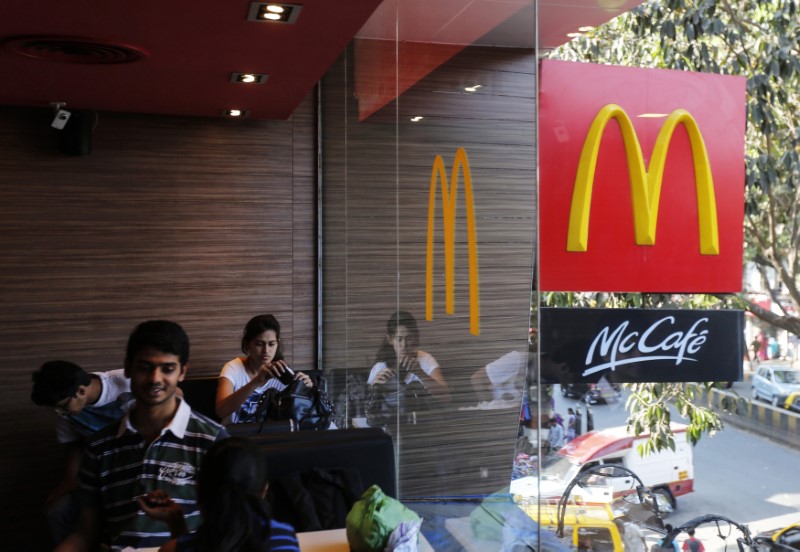 © Reuters. Visitors are seen at a McDonald's restaurant in Mumbai