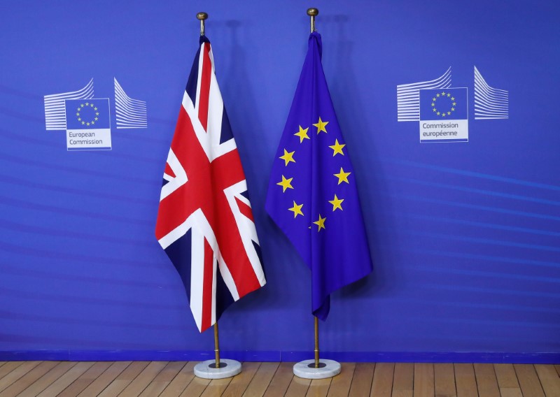 © Reuters. Flags are seen at the EU Commission headquarters ahead of a first full round of talks on Brexit, Britain's divorce terms from the European Union, in Brussels