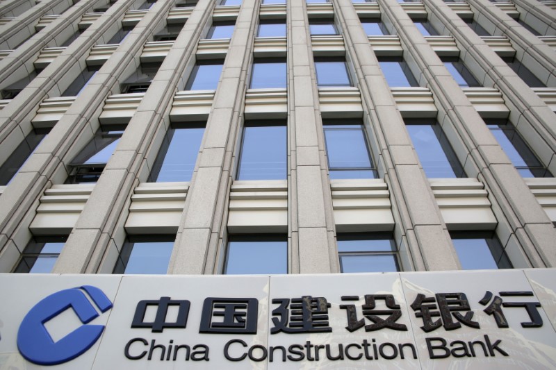 © Reuters. Sign of China Construction Bank is seen at a branch in Beijing