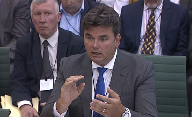 © Reuters. File photograph shows Dominic Chappell, the former bankrupt who bought retail chain British Home Stores in 2015 giving evidence to the business, skills and innovation parliamentary select committee about the collapse of BHS, in Westminster, London