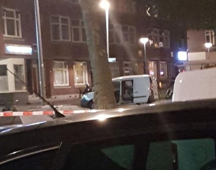 © Reuters. Police investigate a van with Spanish licence plates containing gas canisters which was found near a Rotterdam venue where a rock concert was cancelled