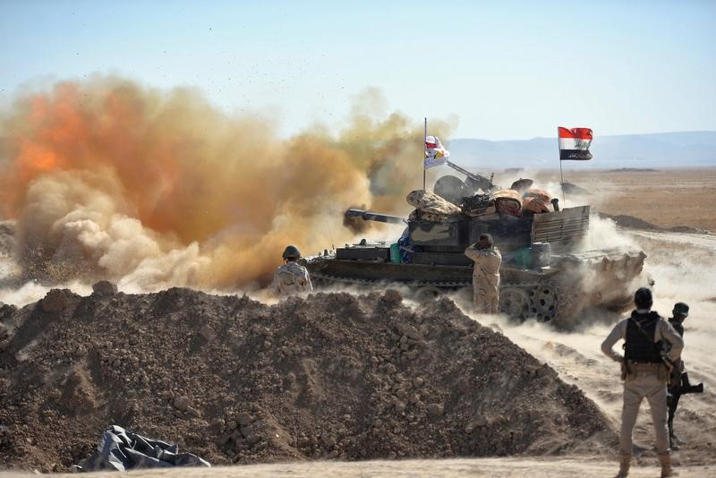 © Reuters. القوات العراقية تضيق الخناق على المتشددين في تلعفر وتستعيد 3 أحياء و5 قرى