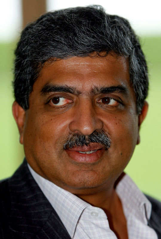 © Reuters. FILE PHOTO - Co-Chairman of the Board of Directors of Infosys Technologies Ltd. Nilekani speaks on the outskirts of New Delhi