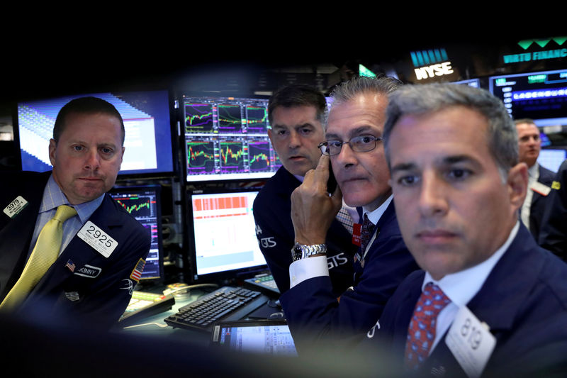 © Reuters. FILE PHOTO: A screen displays trading information for German insurance firm Allianz on the floor of the NYSE in New York