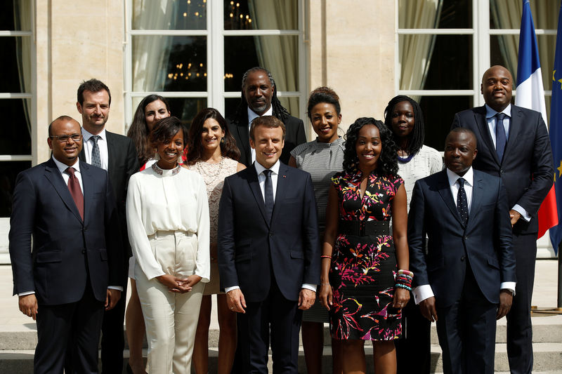 © Reuters. French President Emmanuel Macron poses with members of the new Presidential Council in charge of Africa at the Elysee Palace in Paris