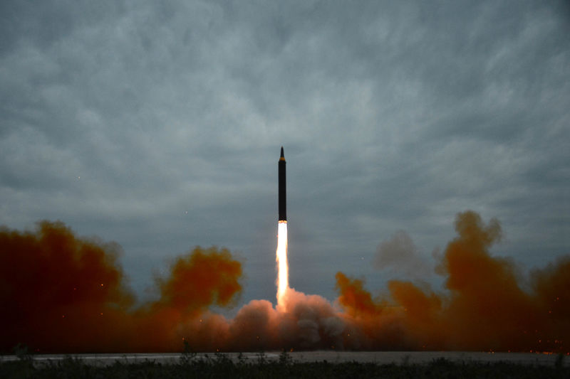 © Reuters. A missile is launched during a long and medium-range ballistic rocket launch drill