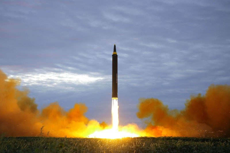 © Reuters. A missile is launched during a long and medium-range ballistic rocket launch drill