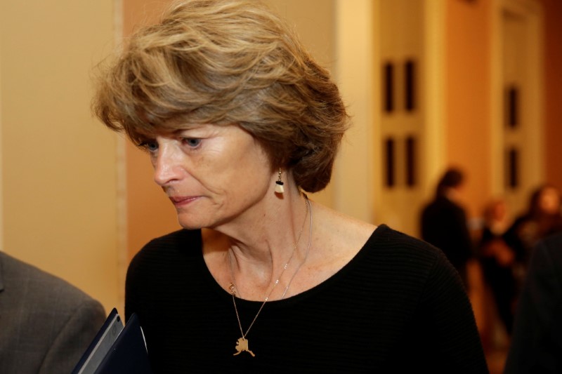 © Reuters. Senator Lisa Murkowski (R-AK) talks to reporters