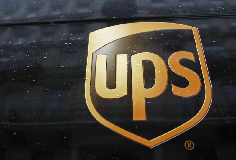 © Reuters. A United Parcel Service logo is seen on a car in center of Warsaw