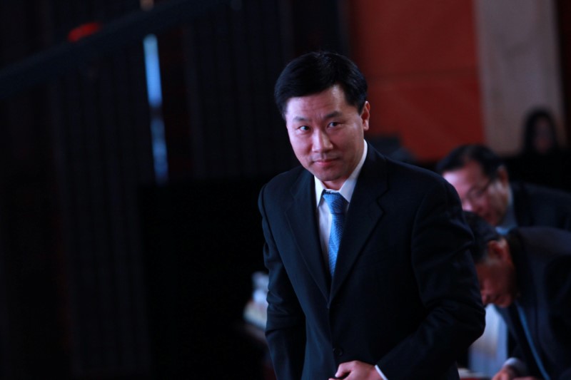 © Reuters. FILE PHOTO - Yao Gang, former vice chairman of China Securities Regulatory Commission (CSRC), attends a forum in Beijing