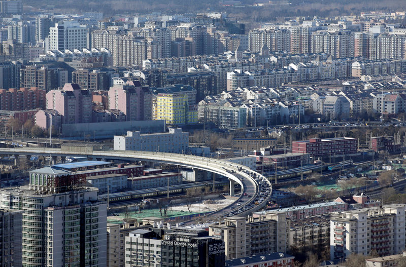 © Reuters. FILE PHOTO - Residential buildings are seen in Beijing