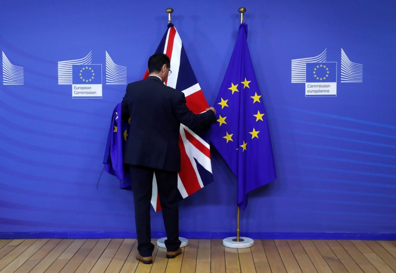 © Reuters. Flags are arranged at the EU Commission headquarters ahead of a first full round of talks on Brexit, Britain's divorce terms from the European Union, in Brussels