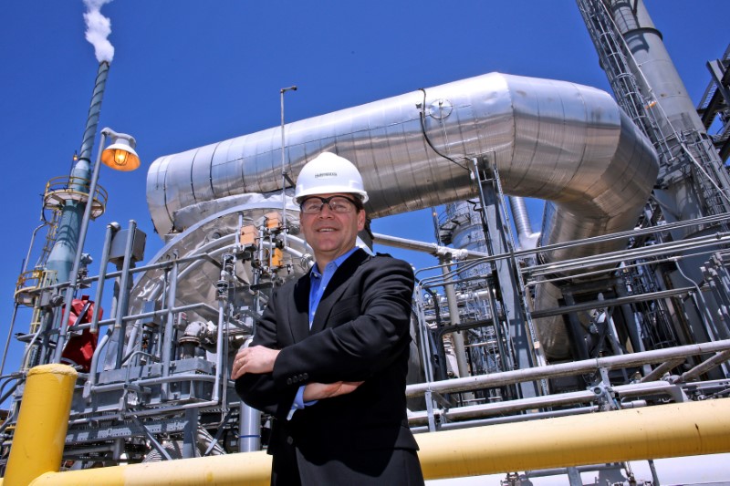 © Reuters. FILE PHOTO:Huntsman CEO Peter Huntsman poses in front of a Maleic Anhydride Unit at Huntsman's polyurethane plant in Geismar, Louisiana