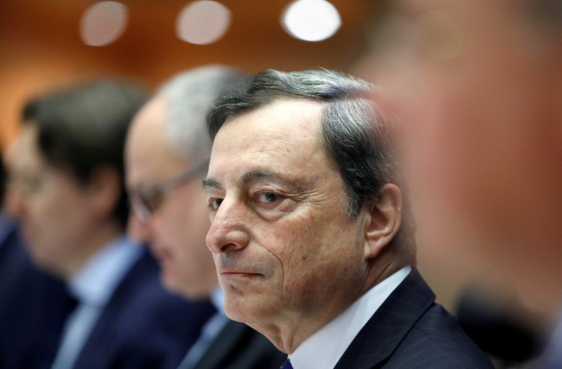 © Reuters. FILE PHOTO:ECB President Draghi testifies before the European Parliament's Economic and Monetary Affairs Committee in Brussels