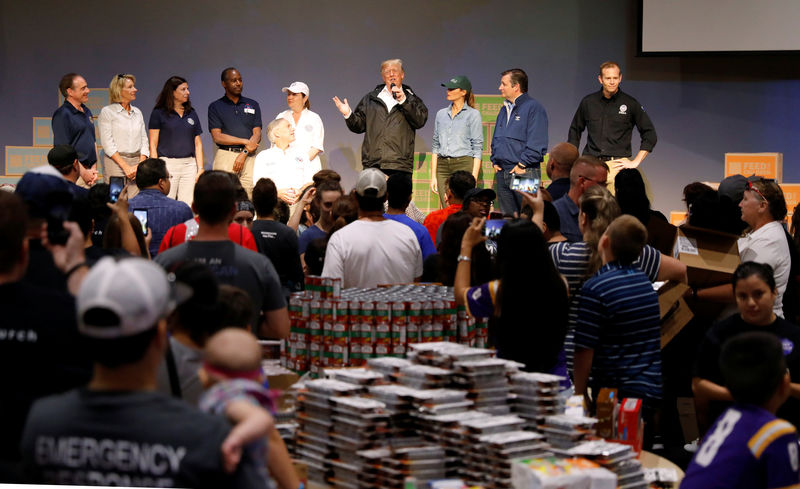 © Reuters. U.S. President Donald Trump speaks at a church relief center during a visit with flood survivors and volunteers in the aftermath of Hurricane Harvey in Houston