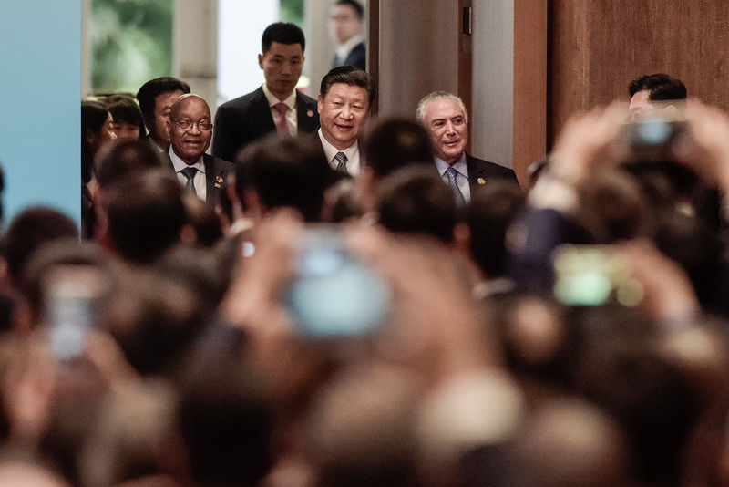 © Reuters. Chinese President Xi Jinping arrives for the opening of the BRICS Summit in Xiamen