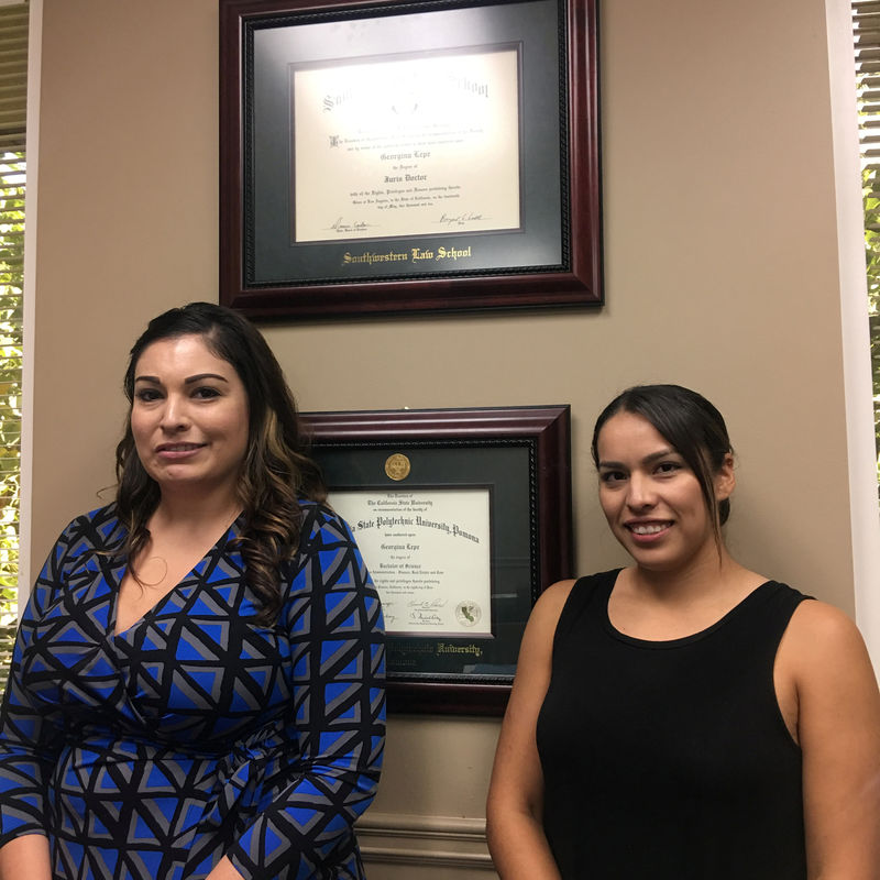 © Reuters. Legal assistant Karla Martinez (R) is pictured with boss Georgina Lepe at Lepe’s law office in Rancho Cucamonga, California. U.S. in this handout photo