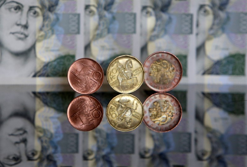 © Reuters. Czech Crown coins and notes are seen in this picture illustration