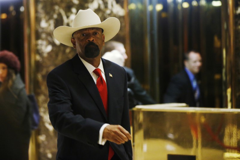 © Reuters. Milwaukee County Sheriff David Clarke Jr. departs after a meeting with U.S. President elect Donald Trump at Trump Tower New York