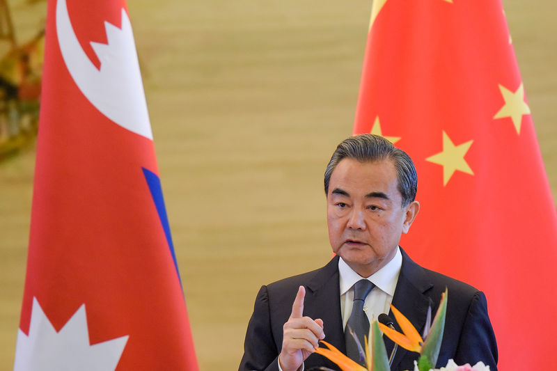 © Reuters. Chinese Foreign Minister Wang Yi speaks during a press conference after his meeting with Deputy PM of Nepal Krishna Bahadur Mahara at the Ministry of Foreign Affairs in Beijing