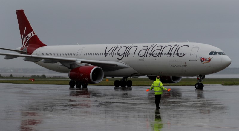 © Reuters. A Virgin Atlantic plane arrives at Liverpool John Lennon Airport in Liverpool northern England.