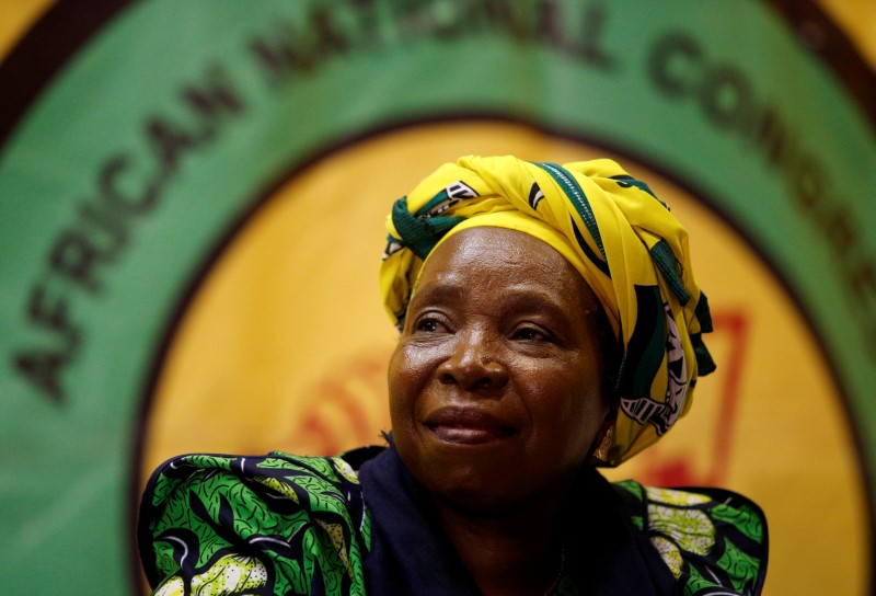 © Reuters. FILE PHOTO: Former African Union chairperson Nkosazana Dlamini-Zuma reacts before addressing a lecture to members of the African National Congress Youth League in Durban