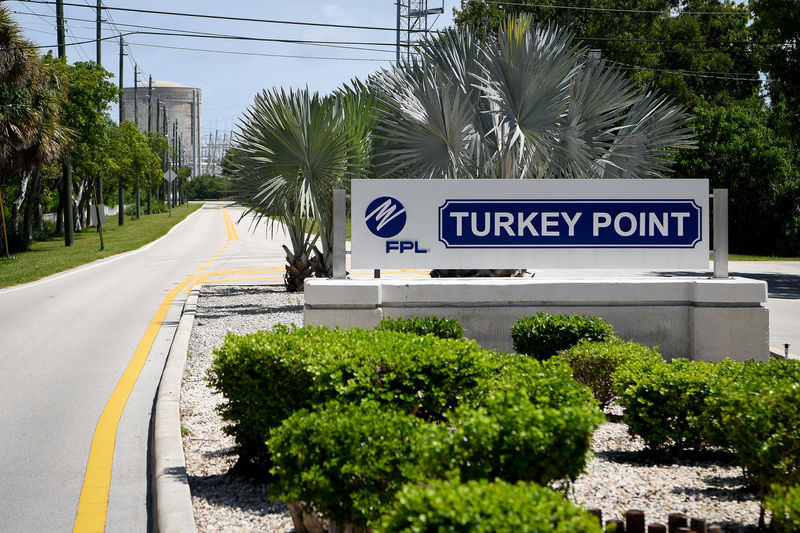 © Reuters. Signs identify the entrance to the Turkey Point Nuclear Power Generation Station is seen as Hurricane Irma approaches Homestead