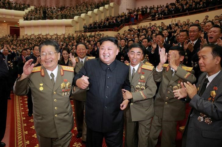 © Reuters. North Korean leader Kim Jong Un reacts during a celebration for nuclear scientists and engineers who contributed to a hydrogen bomb test, in this undated photo released by North Korea's Korean Central News Agency (KCNA)