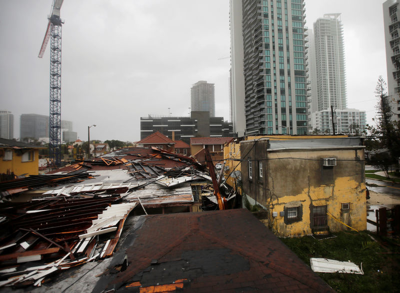 © Reuters. Destroyed roofs at a residential areas are seen as Hurricane Irma passes south Florida, in Miami