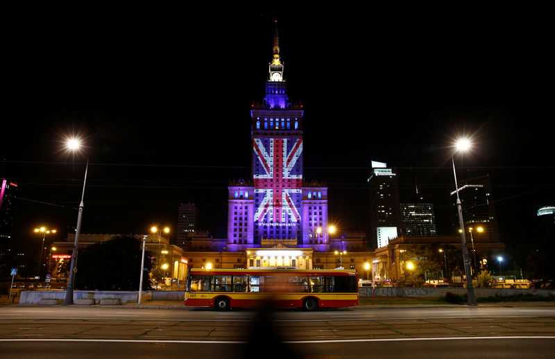 © Reuters. The Palace of Culture and Science is illuminated in Union Jack colours by Warsaw's capital authorities in support of Britain staying in the EU, in Warsaw