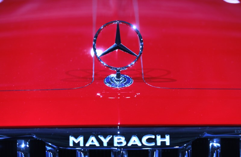 © Reuters. A Mercedes sign is seen on the Mercedes Maybach 6 car before the Daimler annual shareholder meeting in Berlin