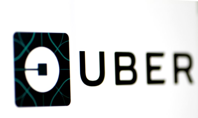 © Reuters. The Uber logo is seen on a screen in Singapore