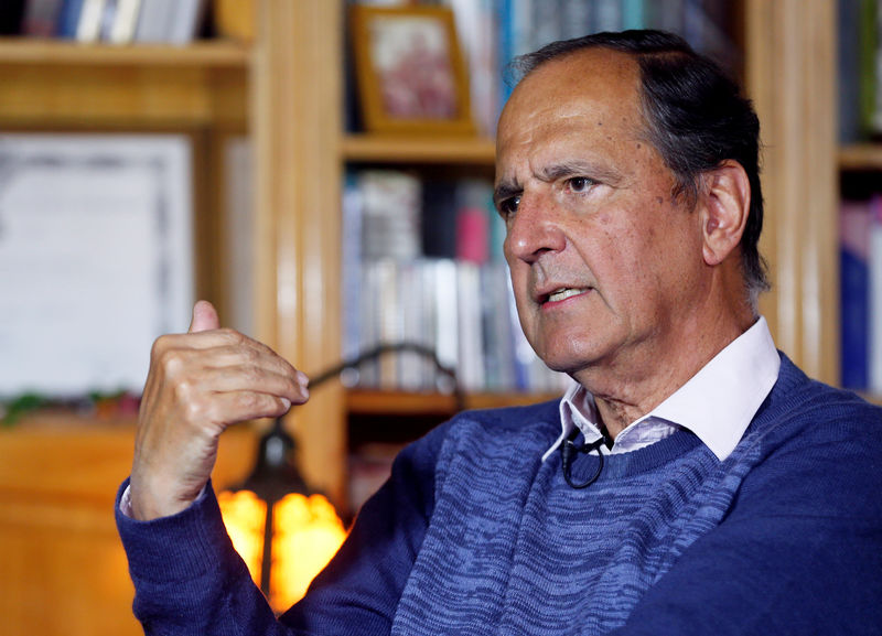 © Reuters. Juan Camilo Restrepo, Colombia's government representative for peace negotiations with the ELN, speaks during an interview with Reuters in Bogota