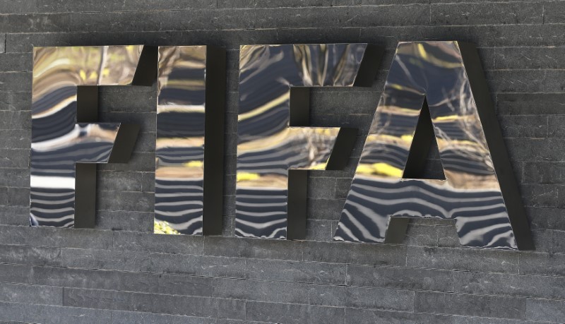 © Reuters. The FIFA logo is seen at the FIFA headquarters in Zurich