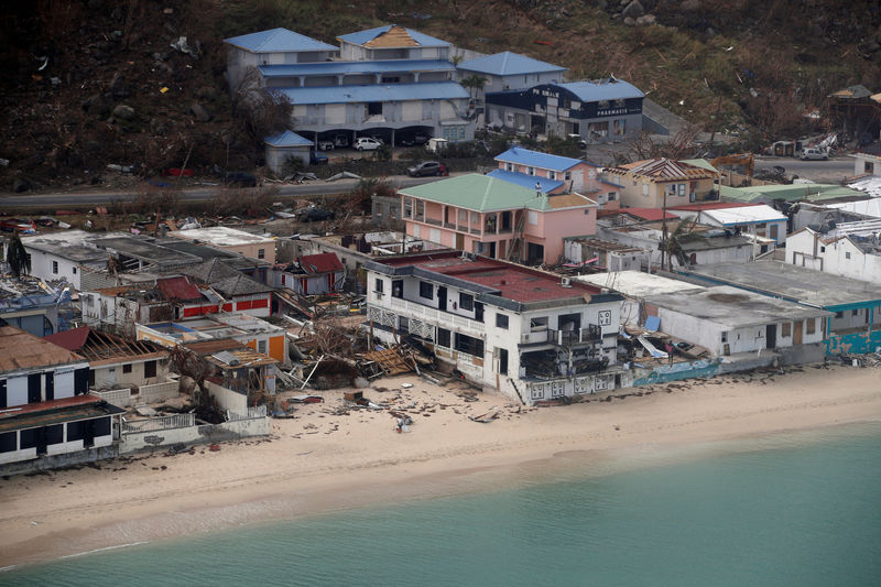 © Reuters. FILE PHOTO: An aerial view of the houses destroyed by Irma during the visit of France's President Emmanuel Macron to the French Caribbean island of St. Martin