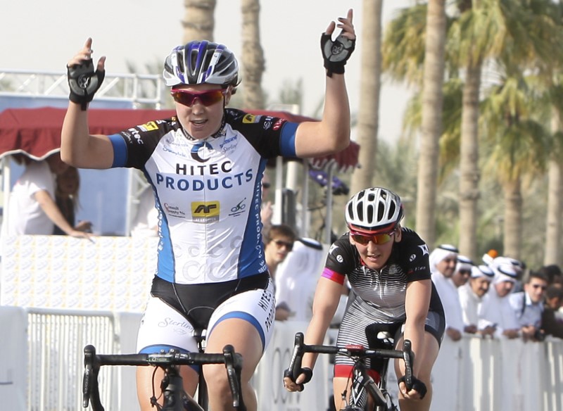 © Reuters. Hosking of Australia celebrates after winning the 97 km first stage of the Tour of Qatar women's cycling race from Doha to Mesaieed