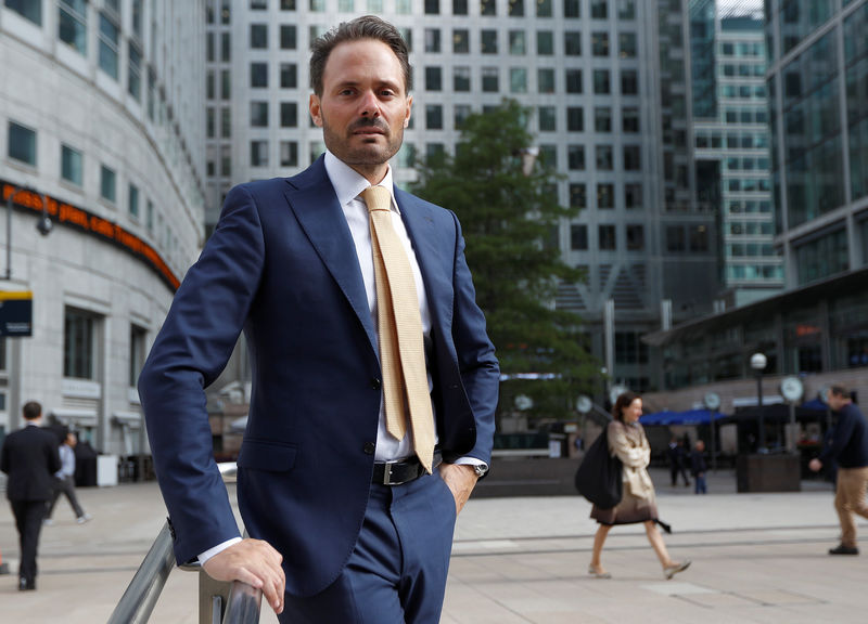 © Reuters. Raffaele Petrone, jr partner at Armonia SGR, poses for a photograph at Canary Wharf in London