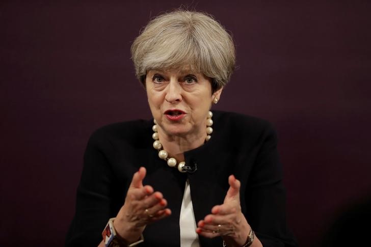 © Reuters. Primeira-ministra britânica, Theresa May, durante evento em Londres