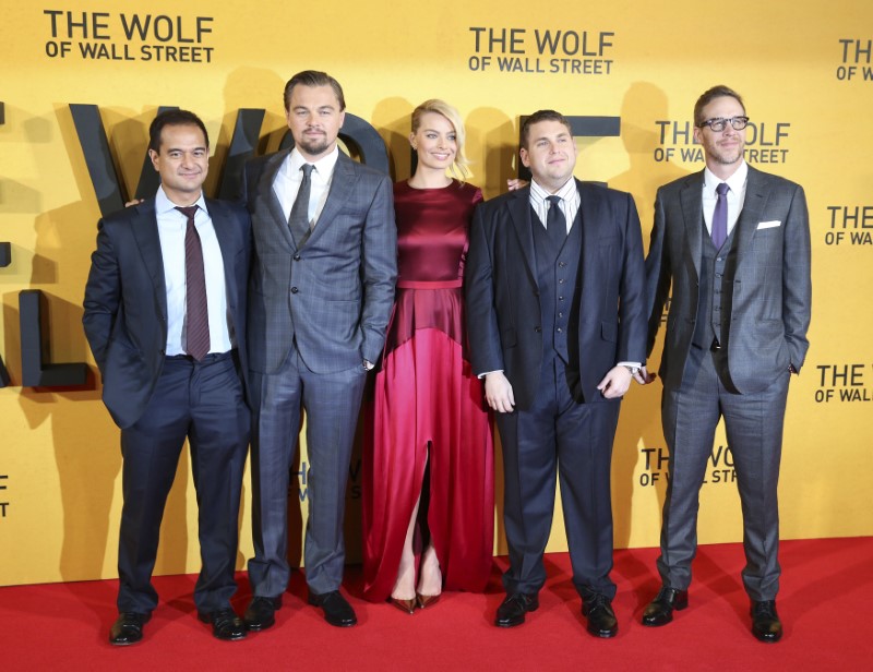 © Reuters. File photo: Producer Aziz, cast members DiCaprio, Robbie, Hill and producer McFarland arrive for U.K. Premiere of "The Wolf of Wall Street" at Leicester Square, in London